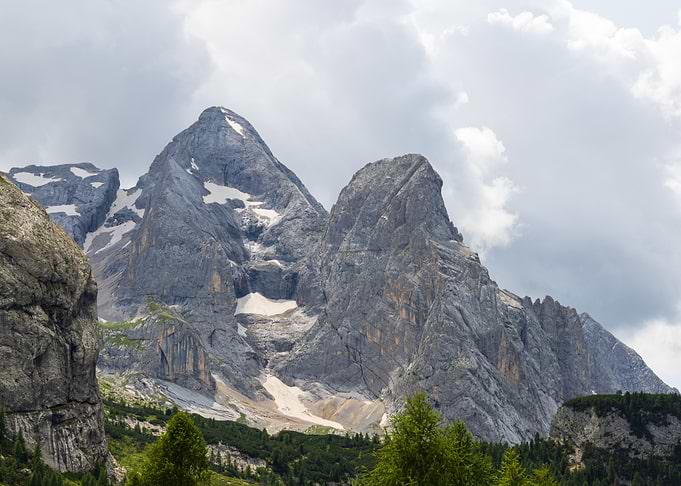 Majestic Marmolada Mountain Peaks Under Cloudy Sky - ITaly