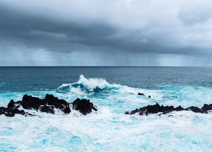 Stormy Ocean Waves Crashing on Rocks
