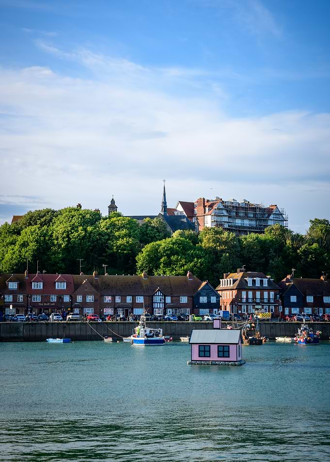 Coastal Town with Pink Floating House