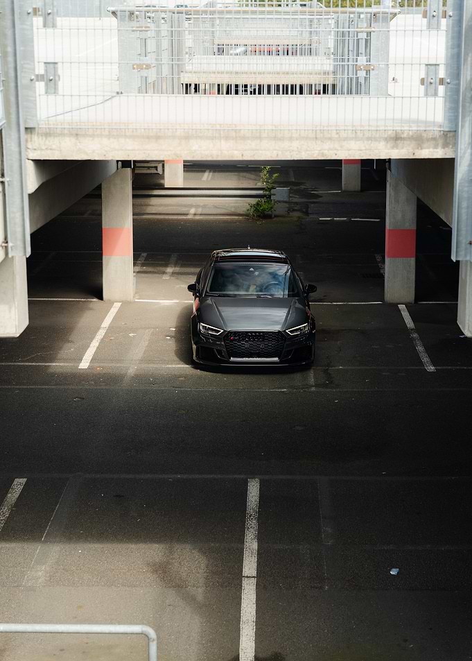 Gray Audi RS3 in Parking Garage