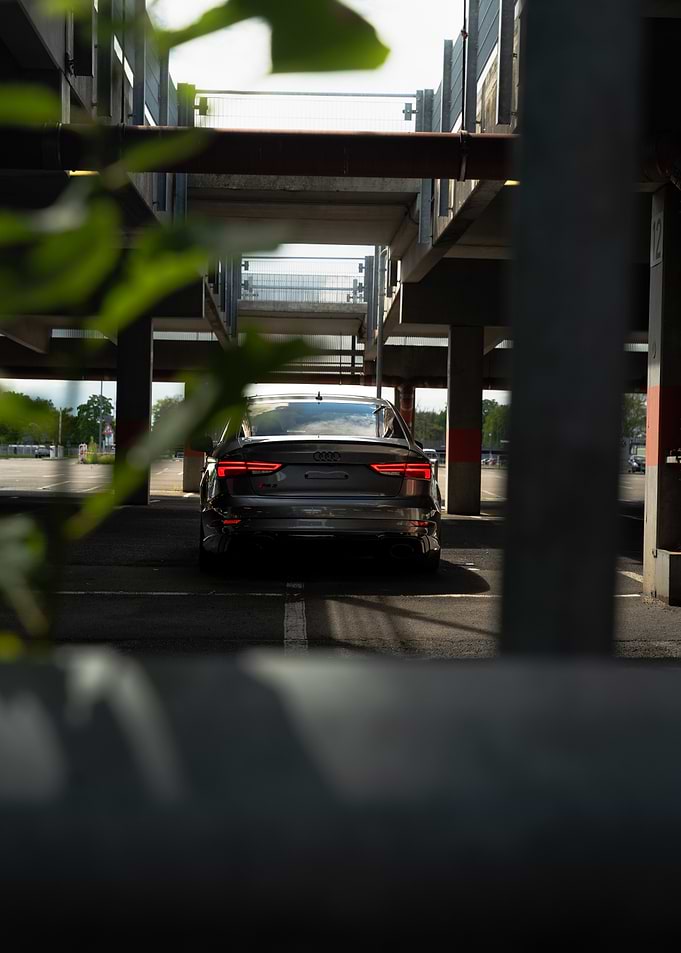 Gray Audi RS3 in Parking Garage