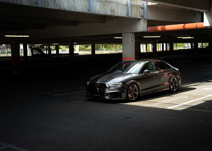 Gray Audi RS3 in Parking Garage