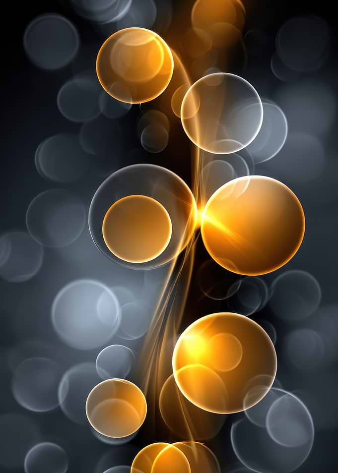 Abstract Golden Spheres on Dark Background