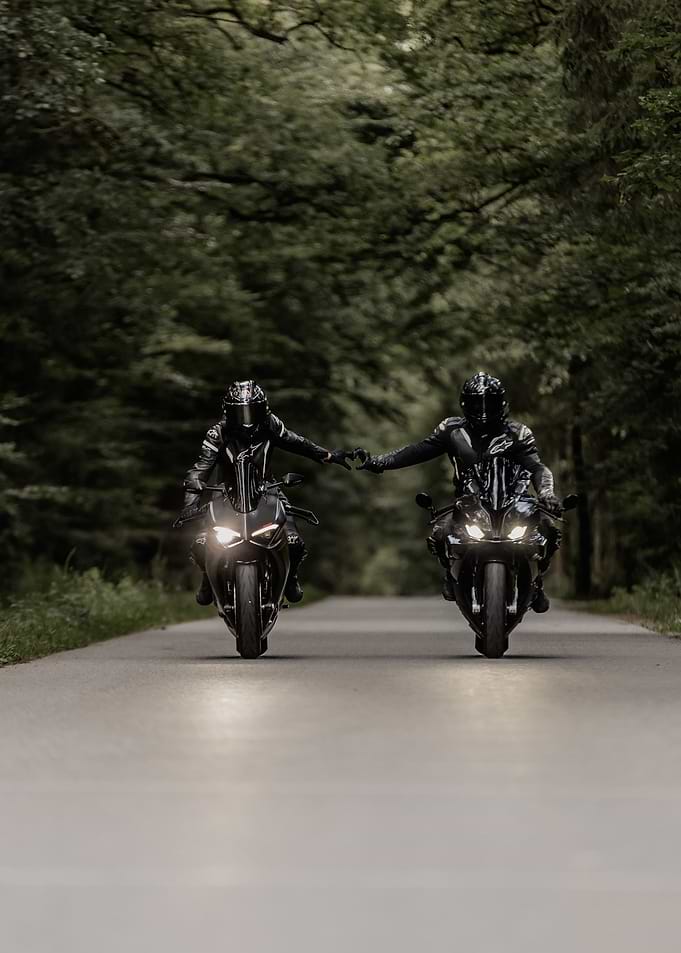 Motorcycle riders making heart shape