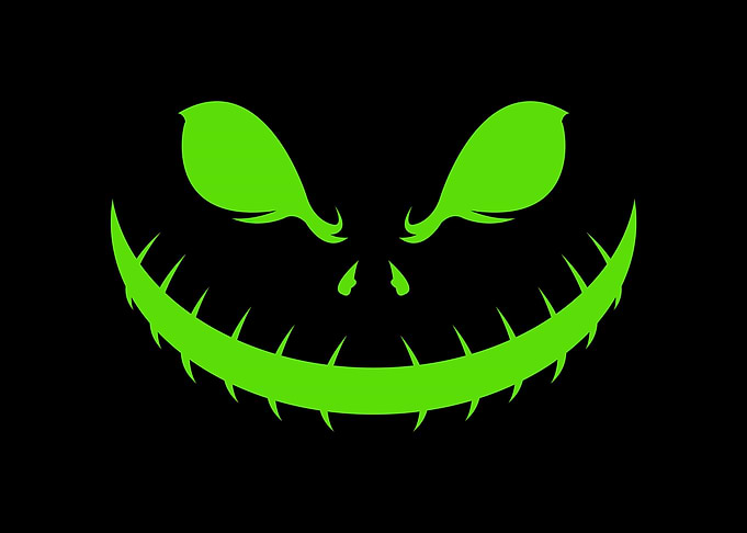 Green Spooky Face on Black Background