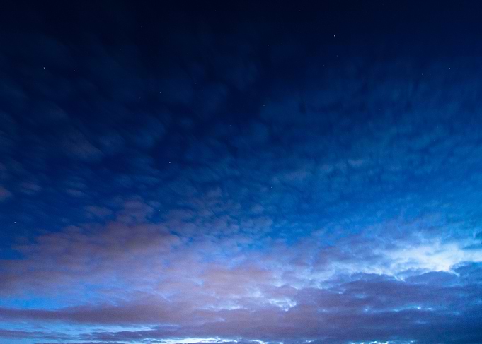 Night Sky with Clouds and Stars