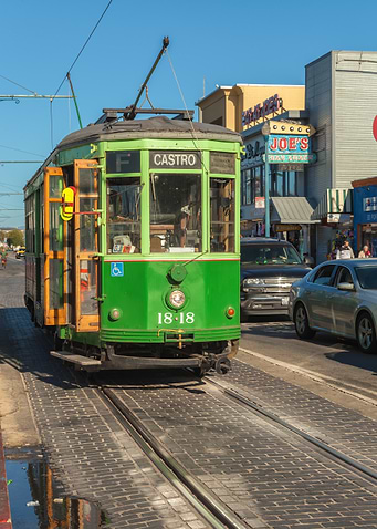 Green San Francisco Streetcar in Urban Setting
