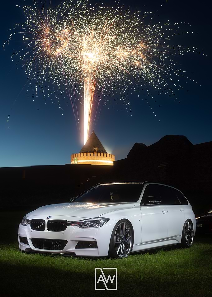 White BMW with Fireworks Display