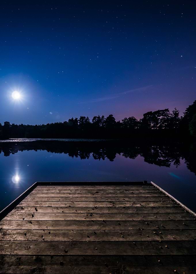 Night Lake Dock Under Starry Sky