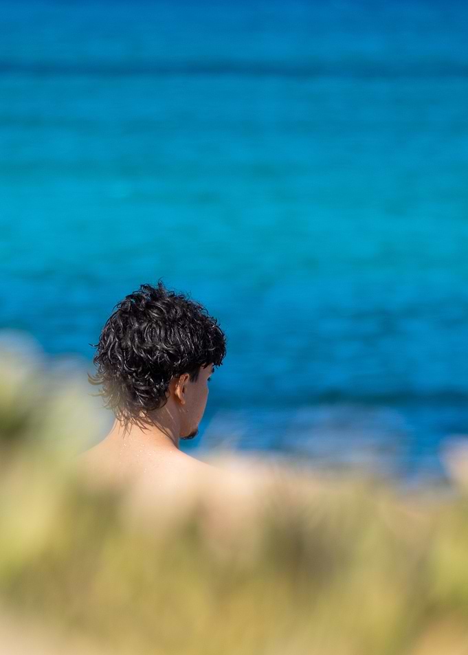 Man Gazing at the Ocean