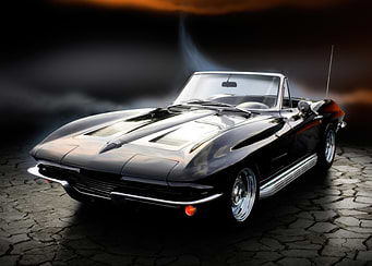 Black Corvette Convertible on Cracked Ground