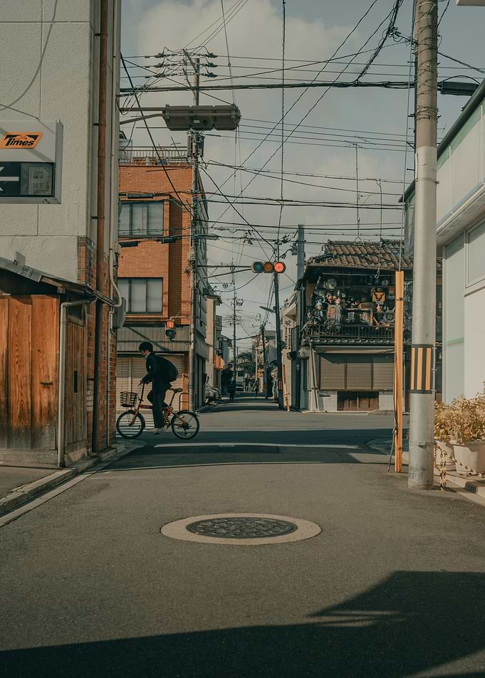 Japanese street with cyclist