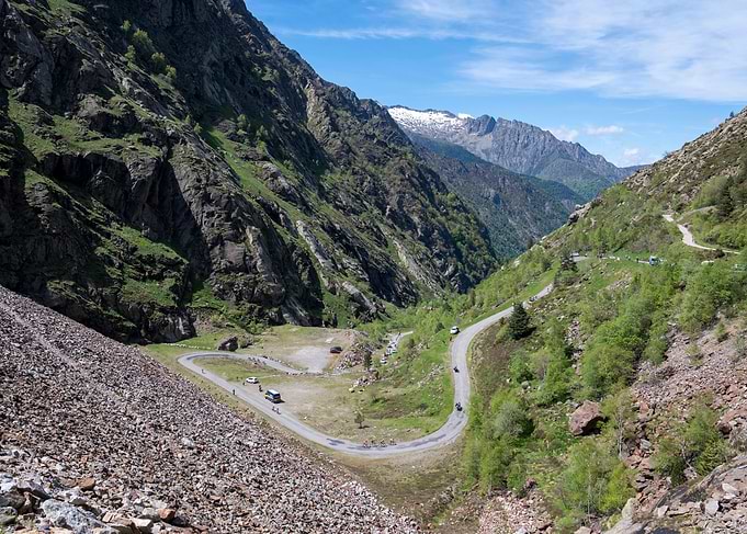 Mountain Pass Road with Cyclist Race