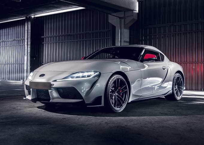 White Toyota Supra in a Garage