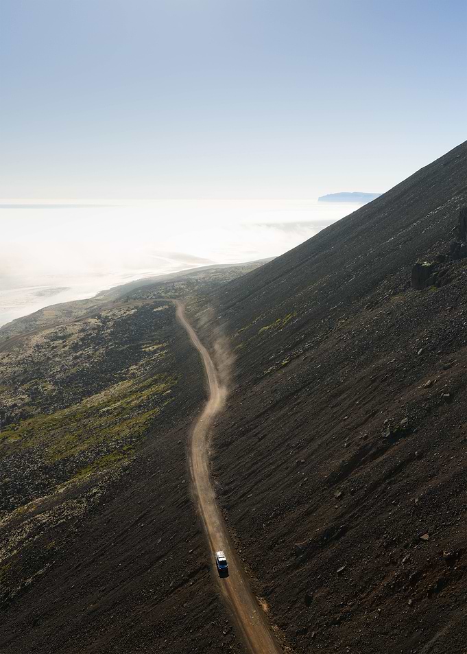 Vehicle on a Mountain Road in Iceland