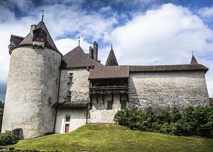 Medieval Gruyères Castle Under Cloudy Sky