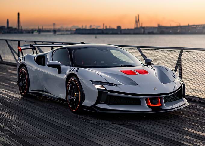 Sleek Gray Sports Car at Sunset