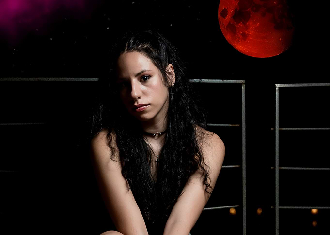 Portrait of a woman with red moon