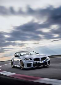 Silver BMW M2 on Racetrack