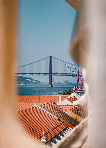 Lisbon 25 de abril Bridge View Through Stone Frame