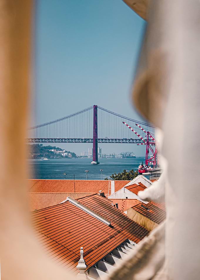 Lisbon 25 de abril Bridge View Through Stone Frame