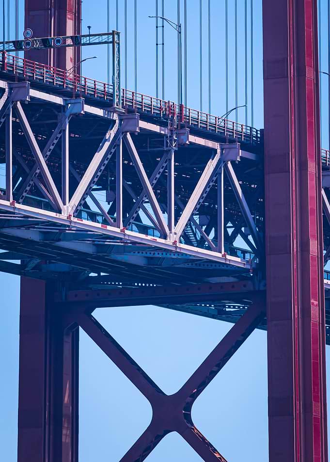 Red Bridge Structure Against Blue Sky