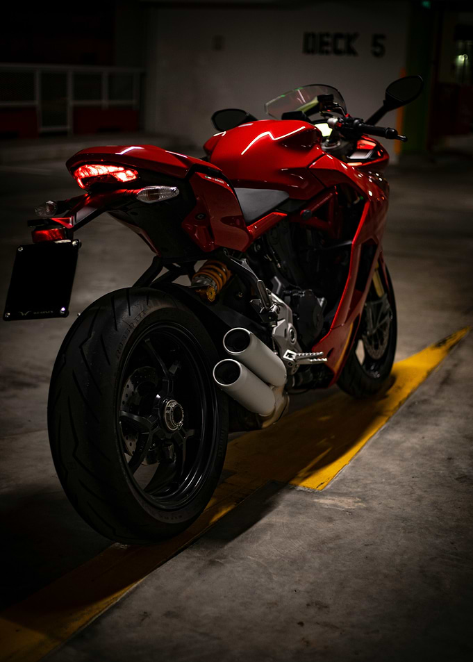 Red Ducati Motorcycle in Parking Garage