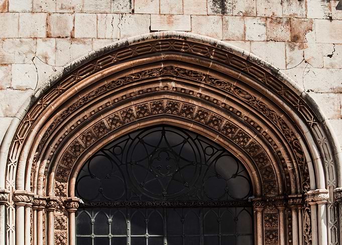 Ornate Stone Archway with Window