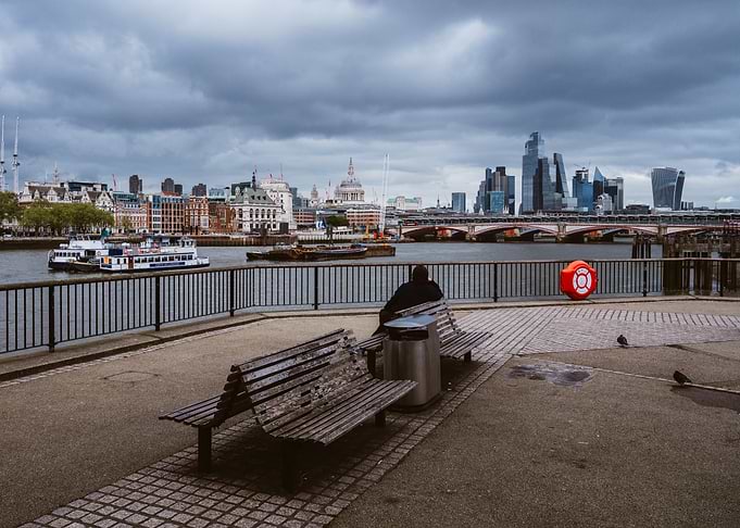 London cityscape with person on bench