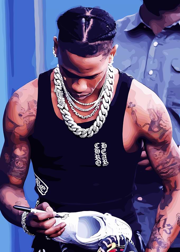 Travis Scott signing a shoe