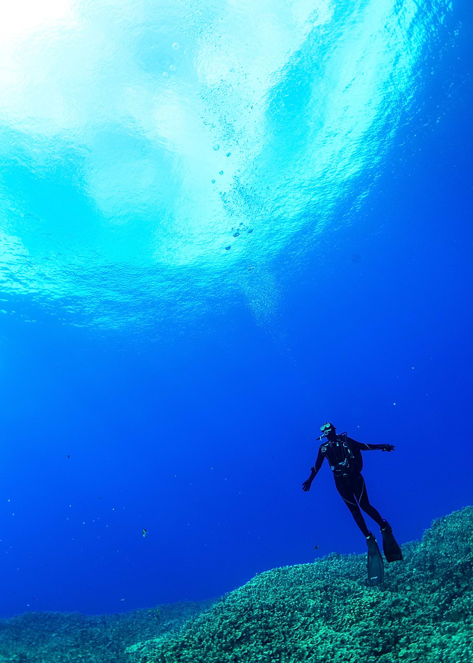 Scuba Diver in Deep Ocean