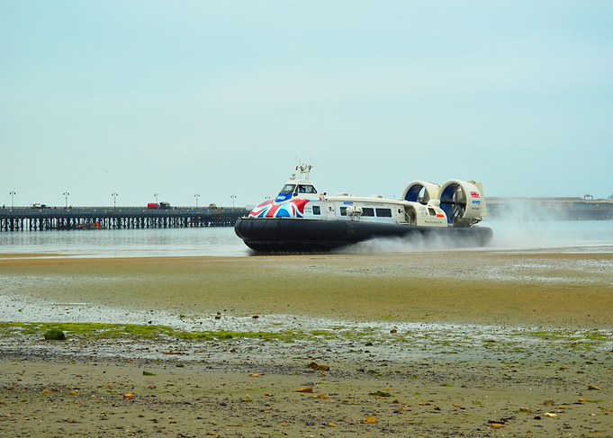 Hovercraft on Beach with Pier