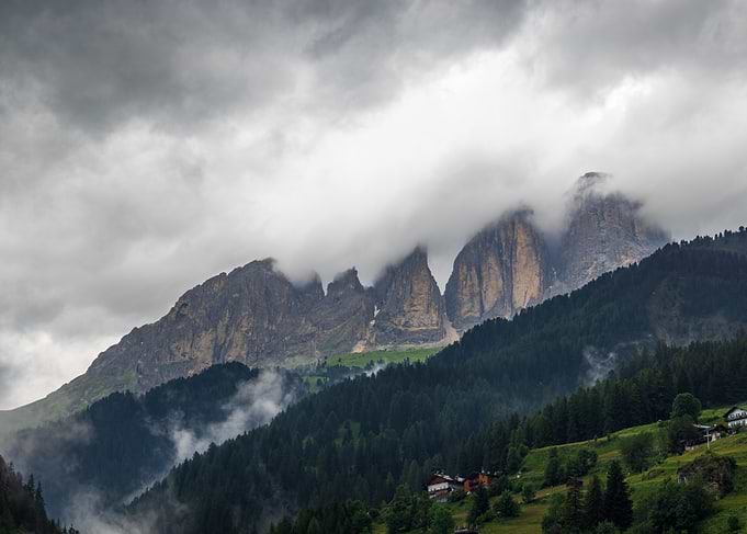 Sassolungo Peaks Under Cloudy Sky - Italy