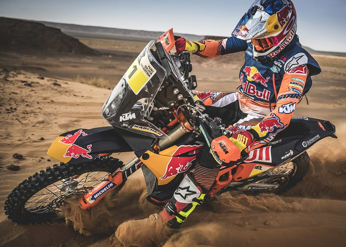 Motocross Rider in Desert Landscape