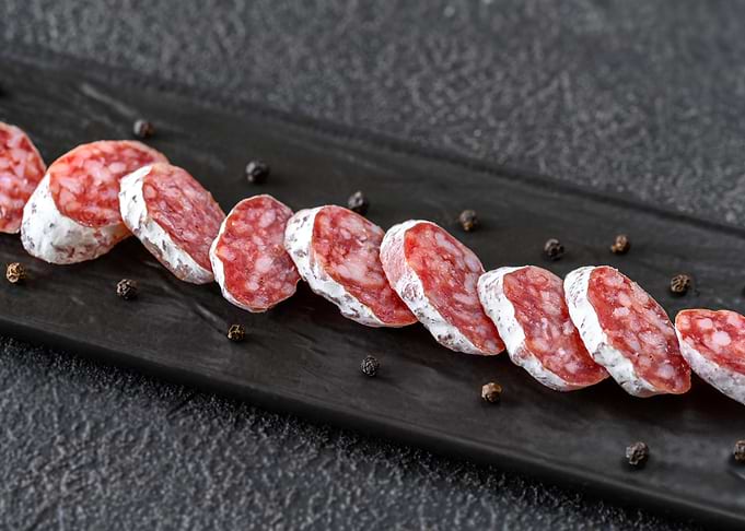 Sliced Fuet Salami with Black Peppercorns