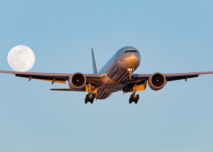 Korean Air Landing with Moon in Background