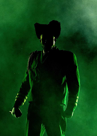 Man in Shadow with Green Lighting