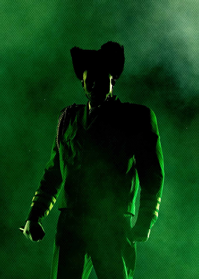 Man in Shadow with Green Lighting