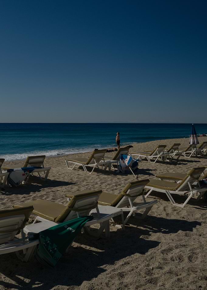 Beach scene with lounge chairs