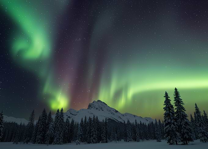 Aurora Borealis over Snowy Landscape