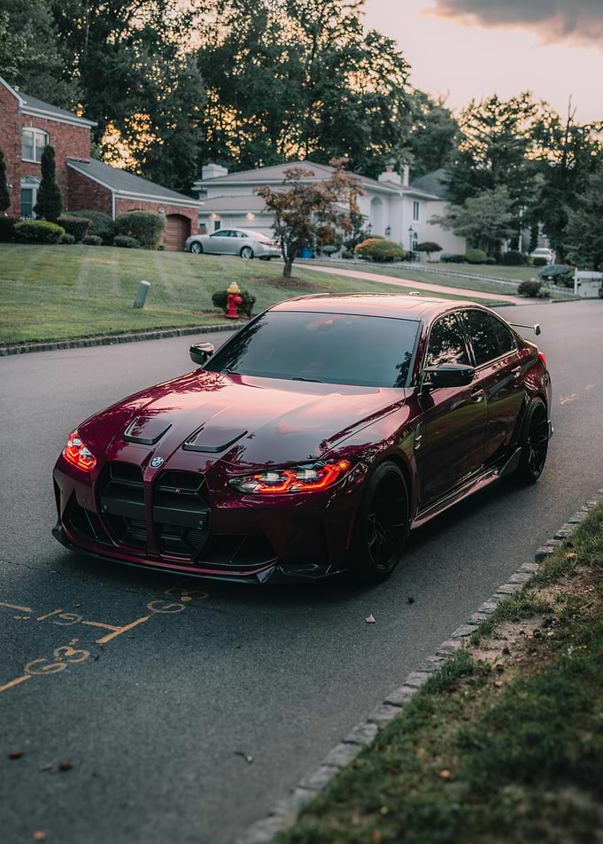 Maroon BMW on Suburban Street