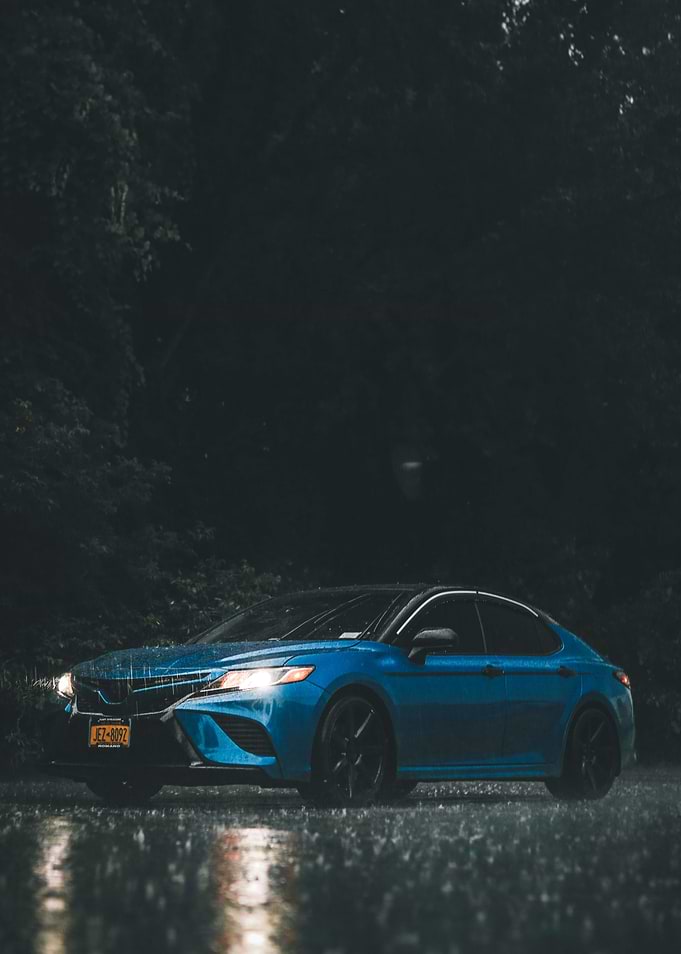 Blue Car in the Rain