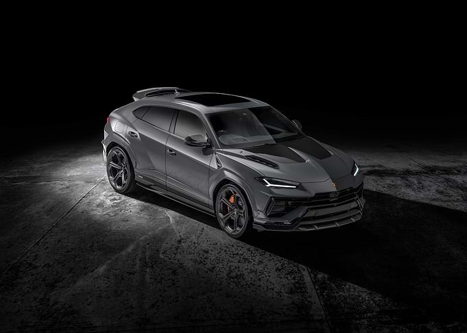 Gray Lamborghini Urus on Dark Background