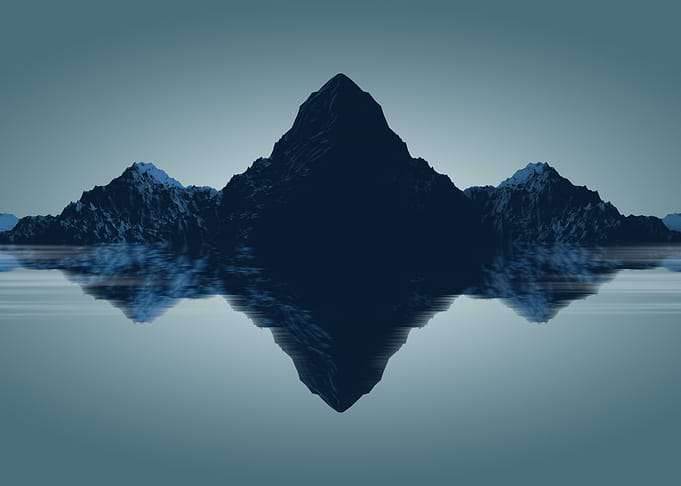 Mirrored Mountain Landscape in Blue Tones