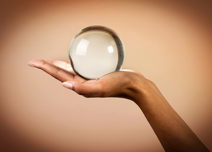 Crystal ball on hand