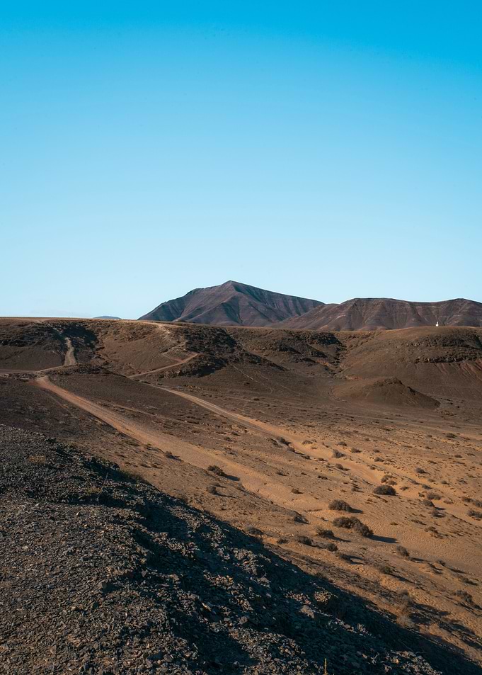 Desert Landscape with Mountains and Sky
