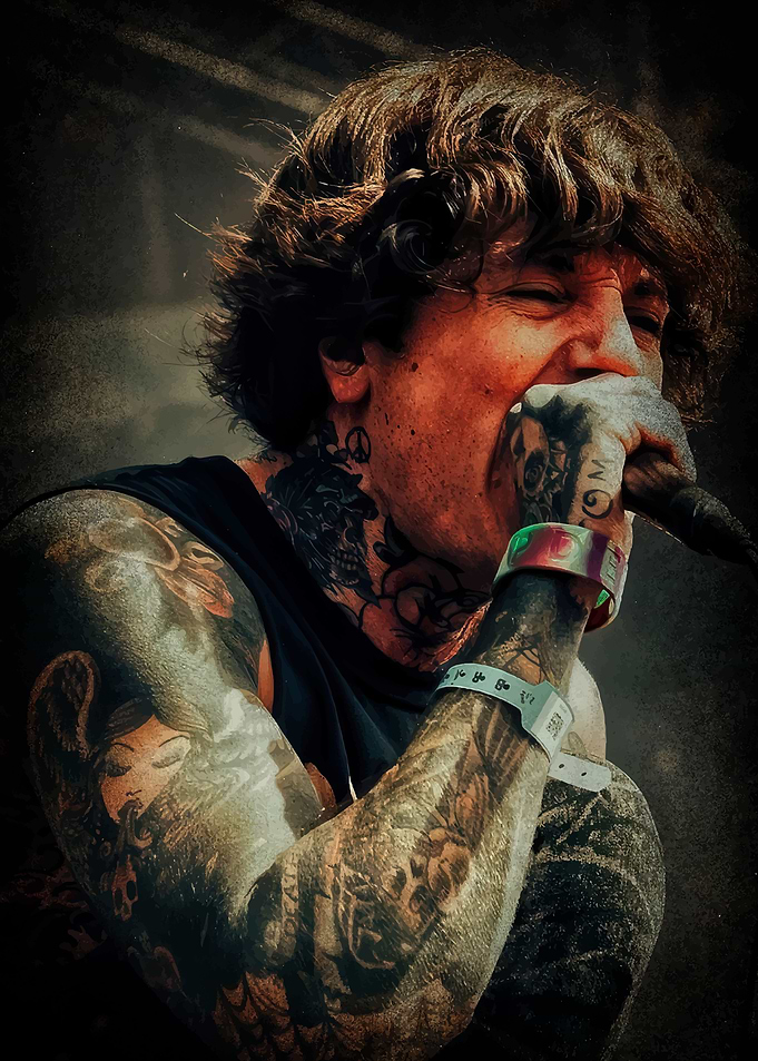 Tattooed Singer Performing Live on Stage