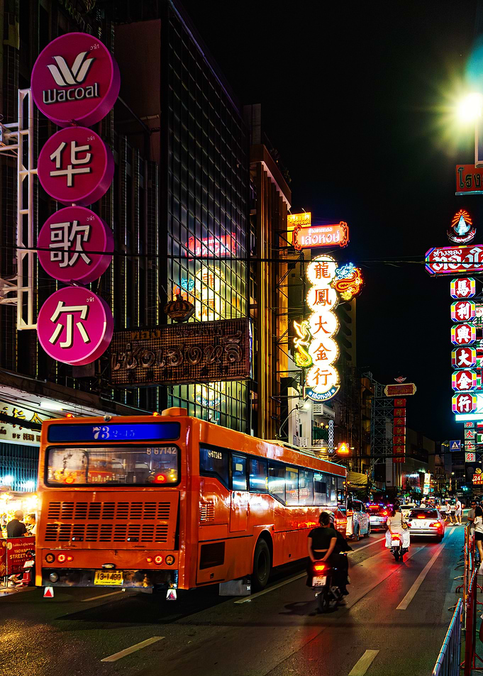 Bangkok China Town street at night with bus