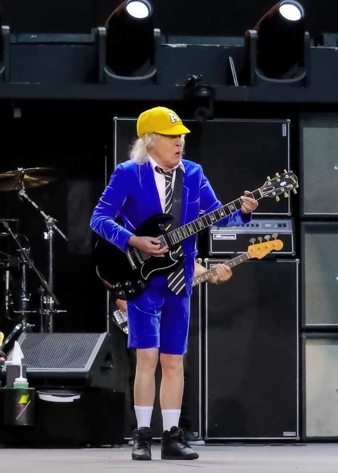 Angus Young performing with AC/DC