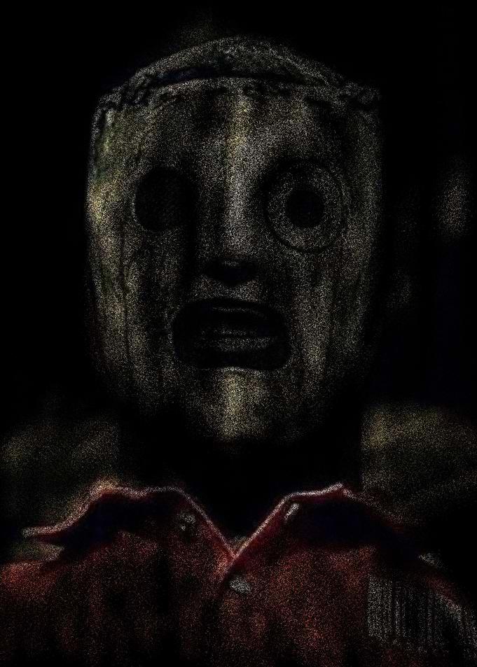 Masked Figure in Dark Setting
